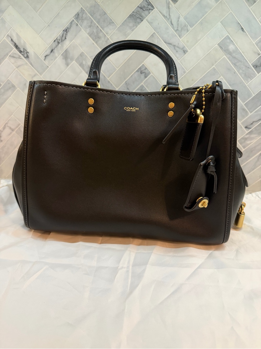 Coach Rogue 31 in black with gold hardware